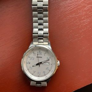 Fossil watch.   Nothing wrong still works. OBO